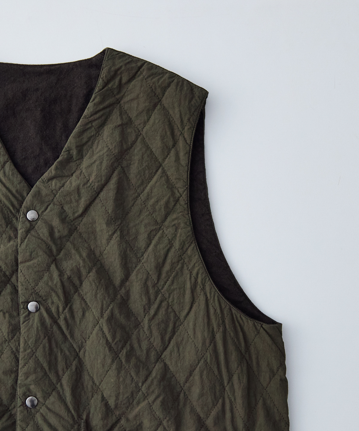 コットンラミー キルティング リバーシブル ベスト｜nest Robe